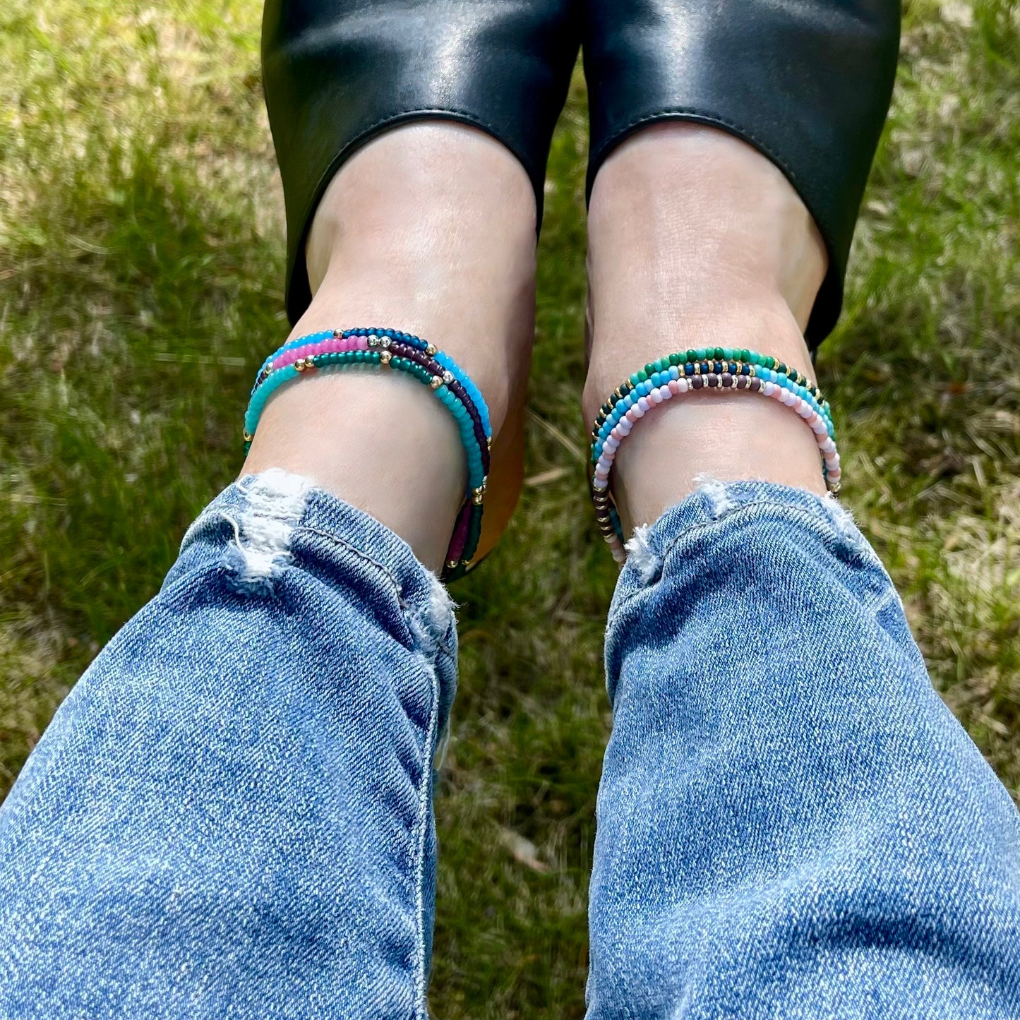 Seed beed anklet stacks with fun colorful seed beads and gold and silver accent beads.