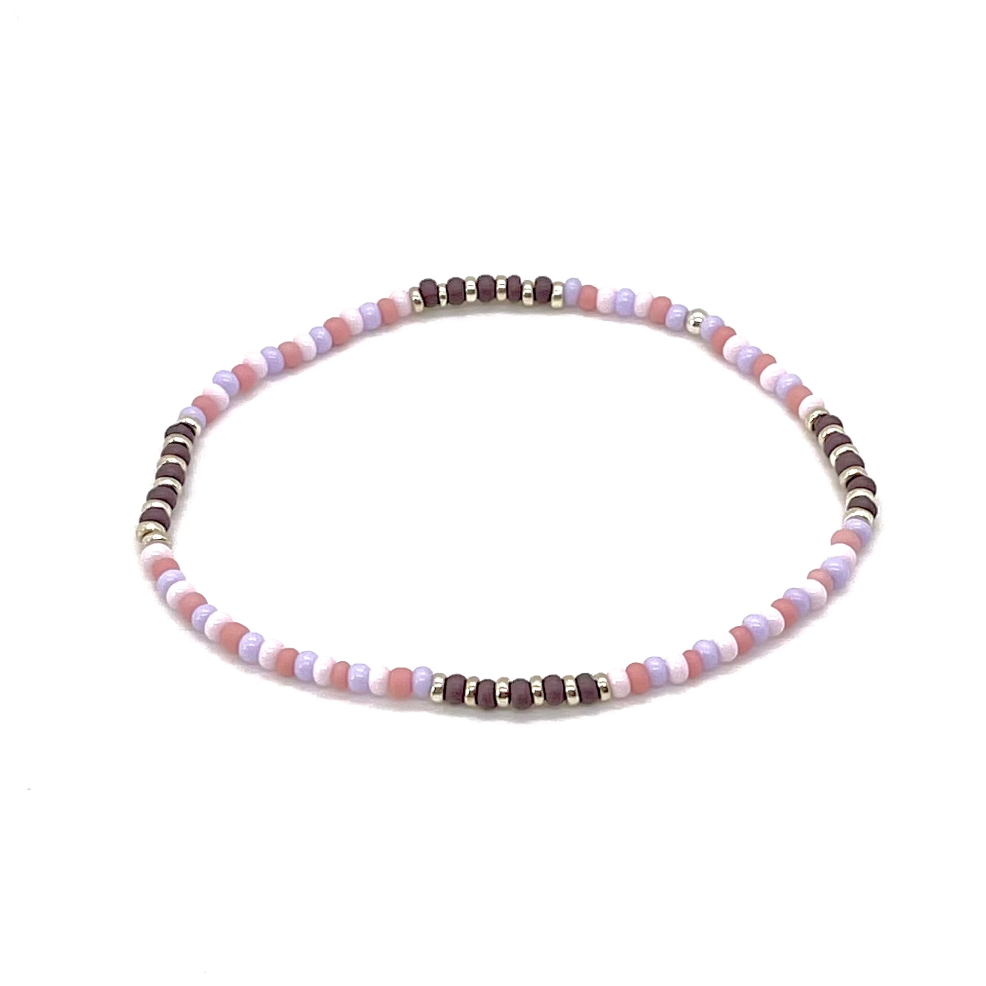 Beach anklet with pink and purple seed beads. Cute waterproof stretch anklet handmade in NYC.