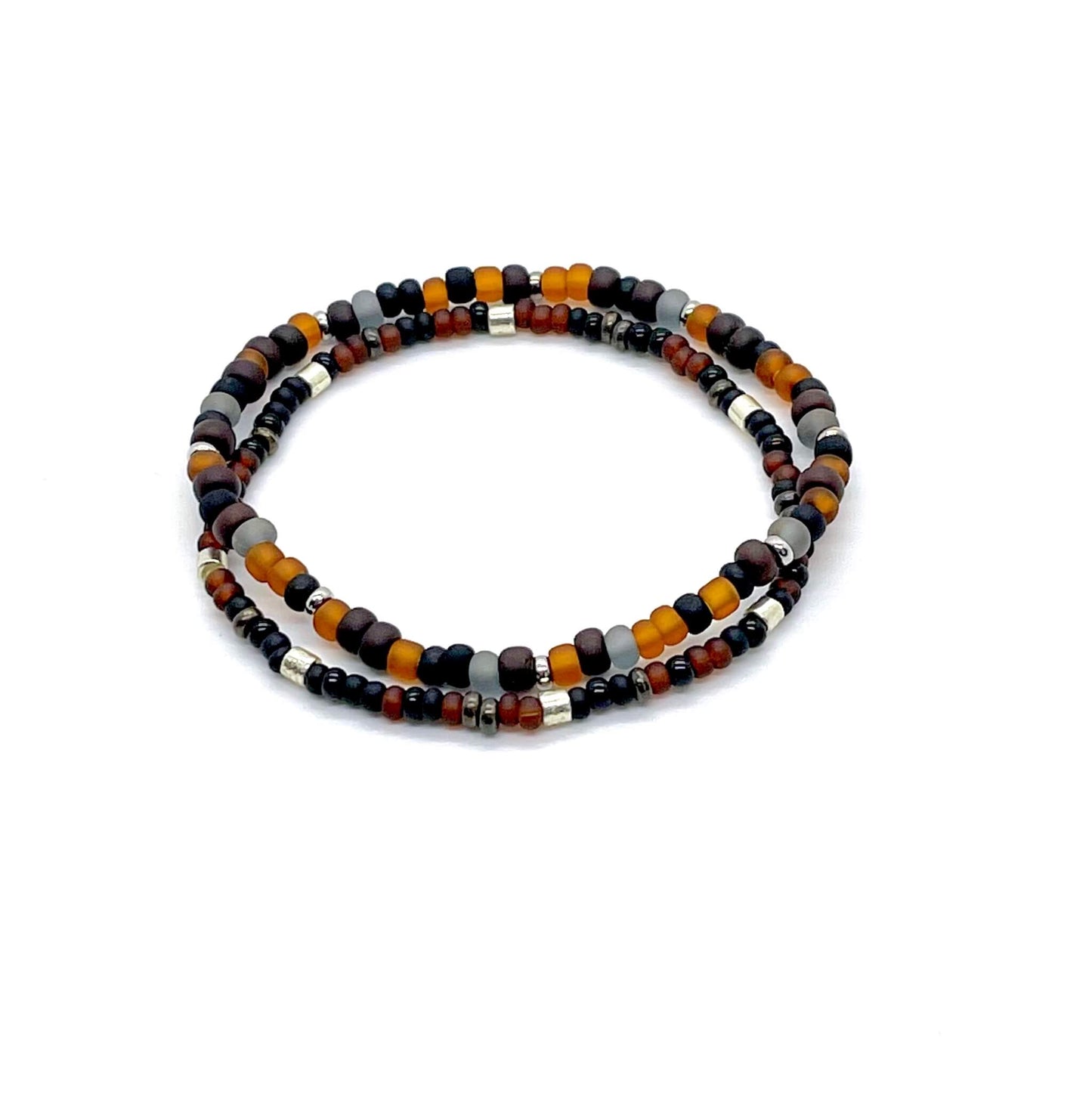 Men’s stackable beaded stretch bracelets with matte brown & amber seed beads or black, brown & silver tone seed beads.