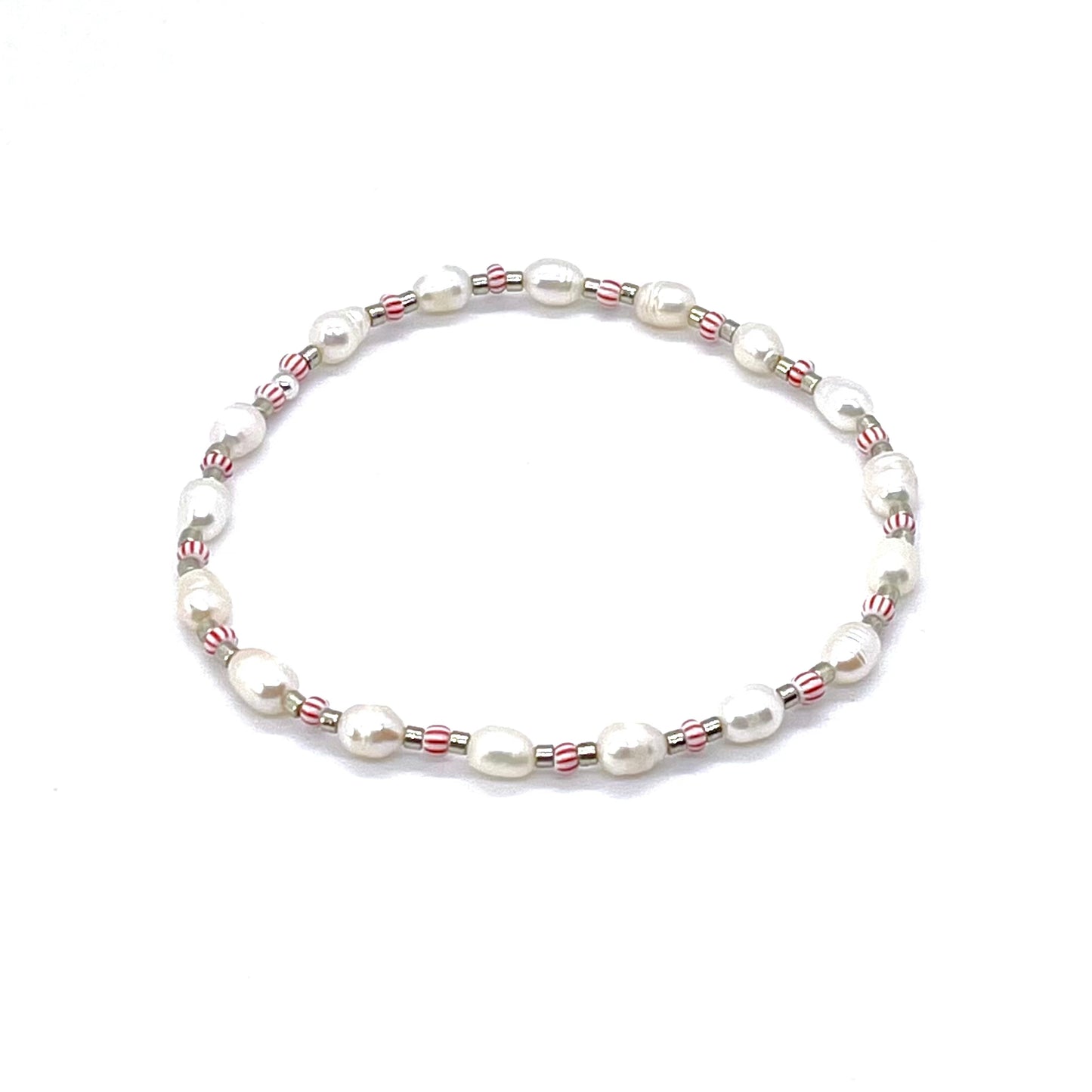 Pearl anklet with silver tone and red & white striped seed beads on elastic stretch cord.