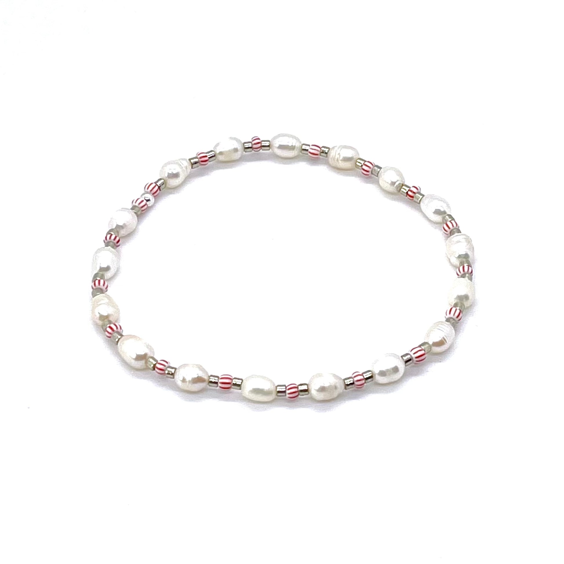 Pearl anklet with silver tone and red & white striped seed beads on elastic stretch cord.