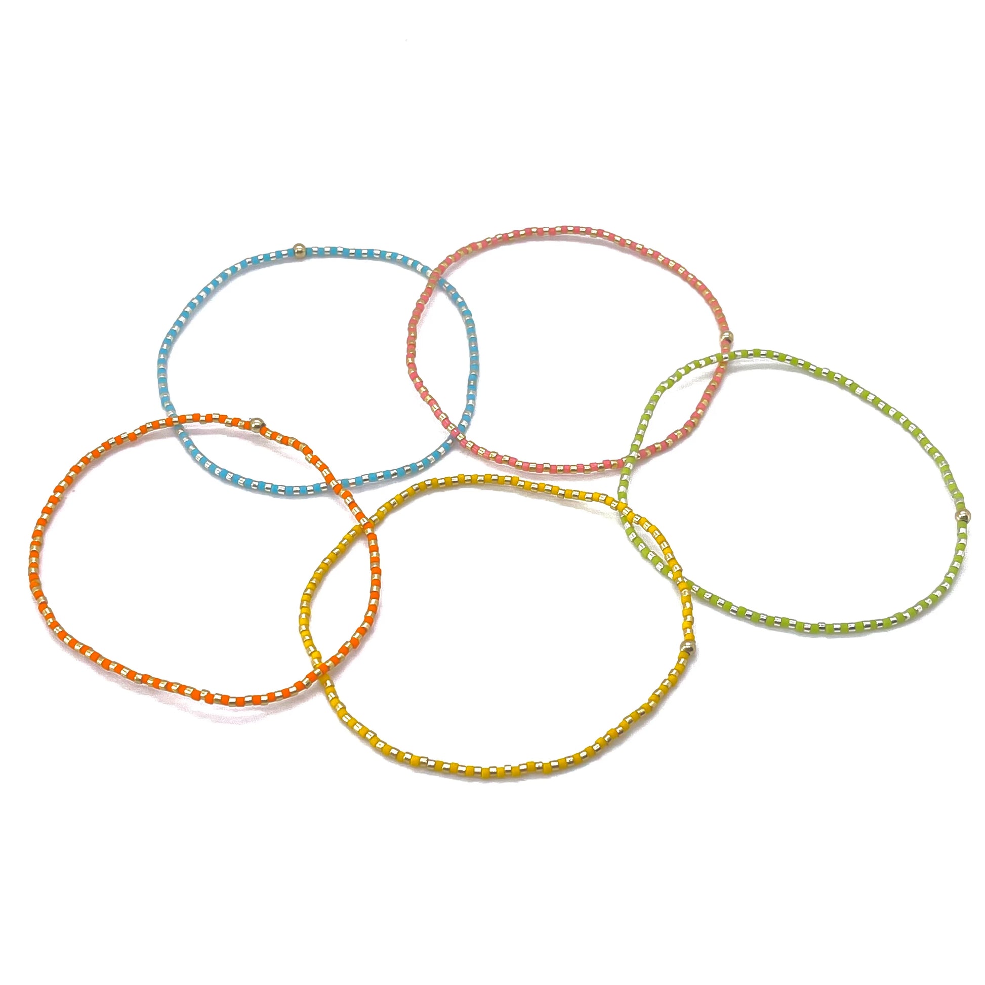 Seed bead anklets in tuttie frutti colors. Fun, stretch ankle bracelets in summer colors.