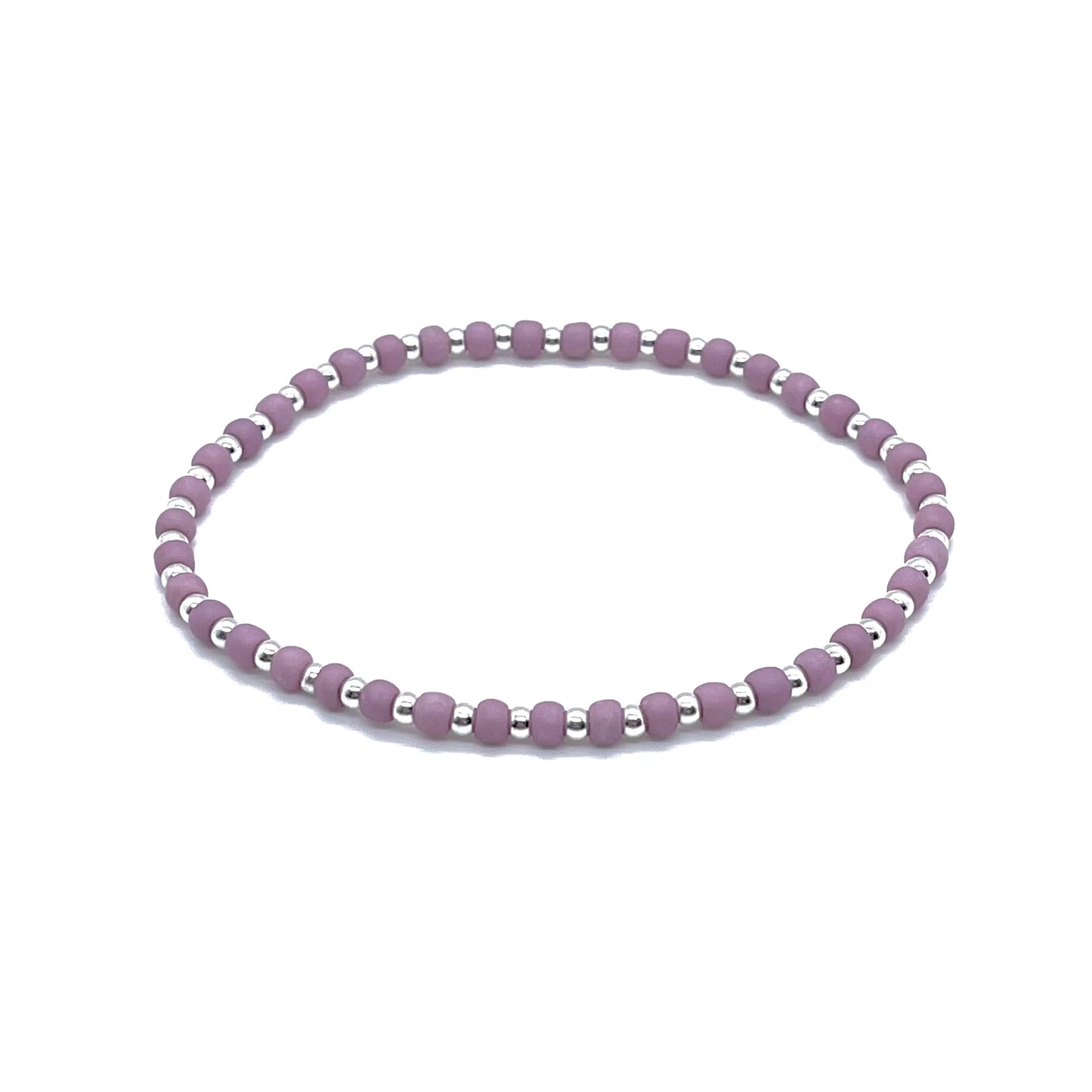 Silver ankle bracelets with 3mm balls and alternating matte lilac mauve seed beads on elastic stretch cord.