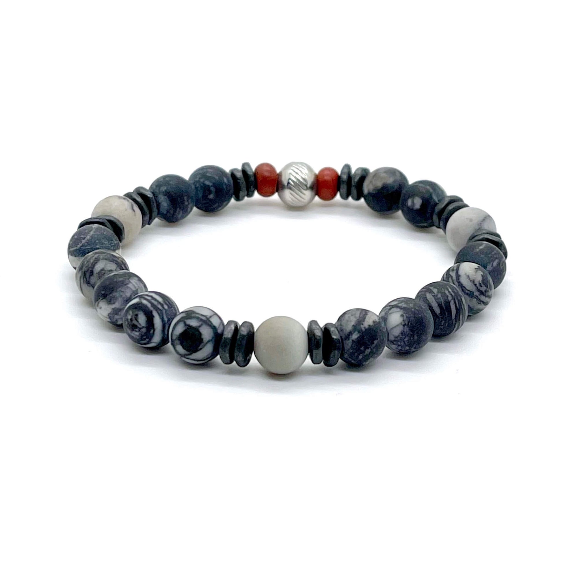 Men's modern swirled white and black gemstone bracelet with red accent beads.