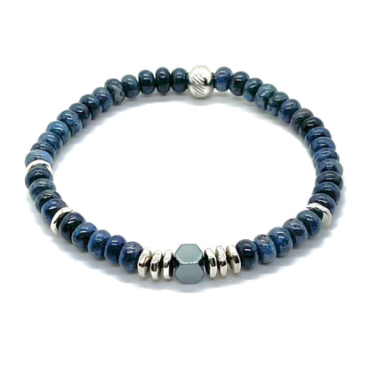 Beaded bracelet for men with blue dumortierite rondelle beads, silver nugget beads, and hematite.