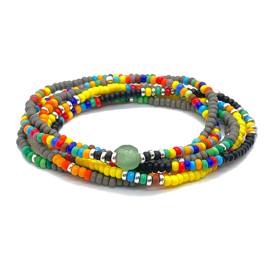 Beads for men. Men's bracelet stack with seed beads in assorted bright colors combined with black, gray, and silver accent beads.