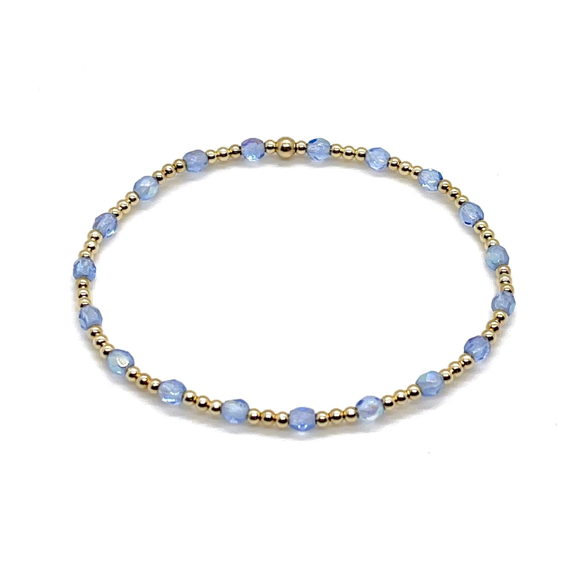 Blue crystal bracelet with gold beads. Handmade delicate beaded bracelet for women.