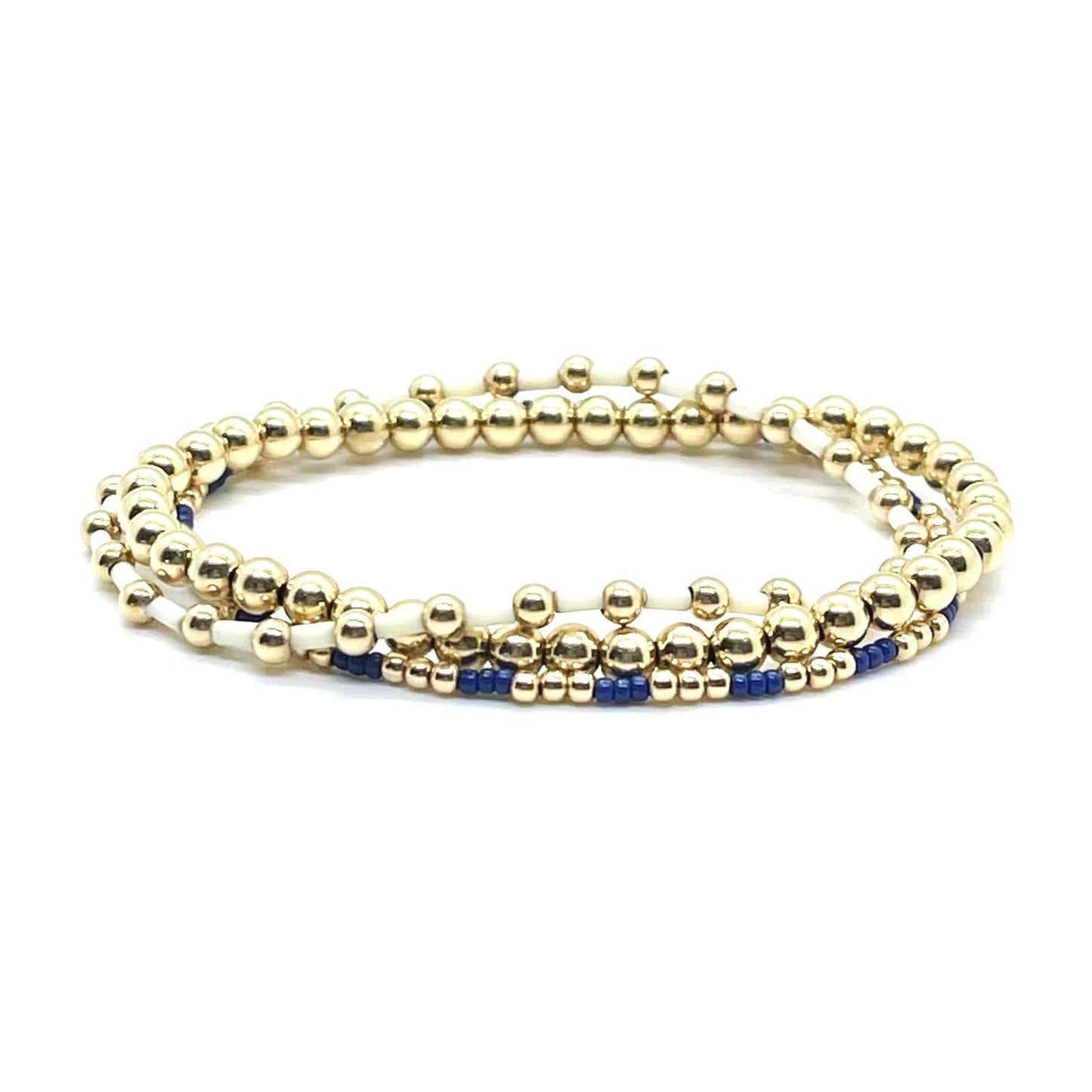 14K gold filled beaded stretch bracelets with navy and ivory seed beads. Stack of 3. 