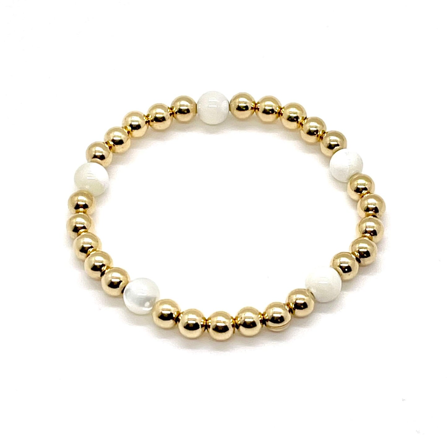 Bracelet with pearl and gold beads. 14K gold filled 5mm beads and 6mm mother-of-pearl beads.