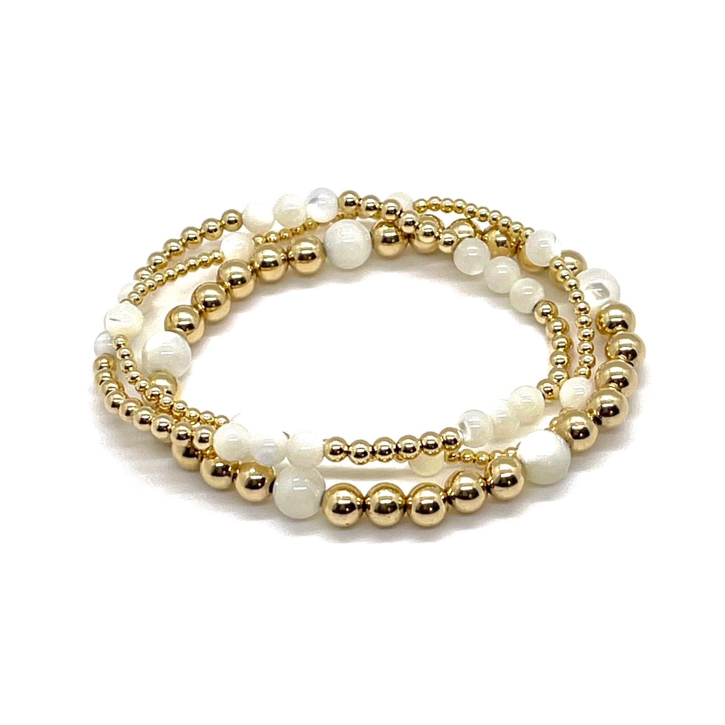 Bridal jewelry sets with pearl and 14K gold filled beads. Custom handmade bracelets.