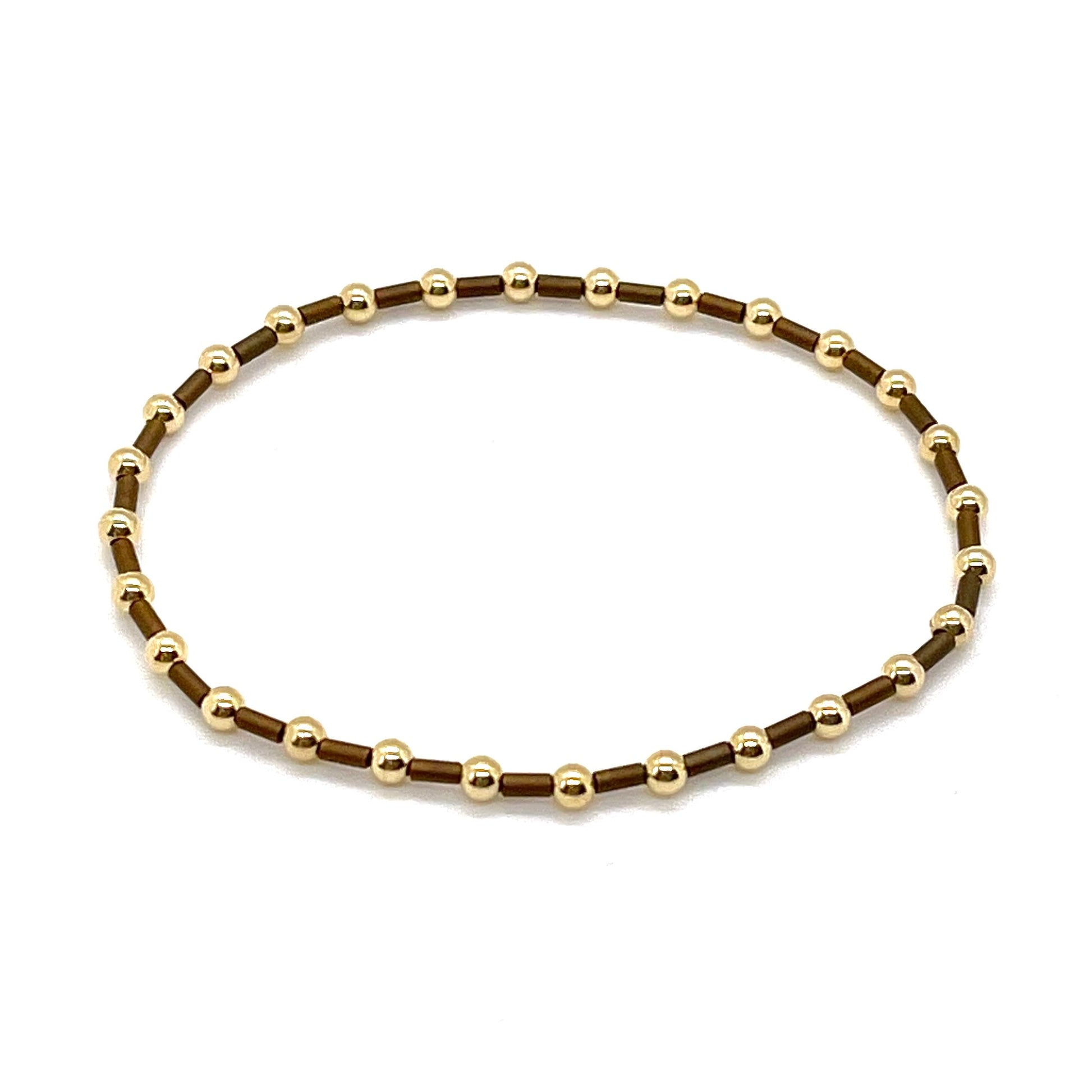Brown and 3mm gold bead women's stretch bracelet.