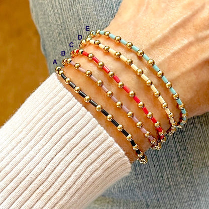 Colorful bugle seed bead bracelets with alternating 14K gold fill ball beads on elastic stretch cord.