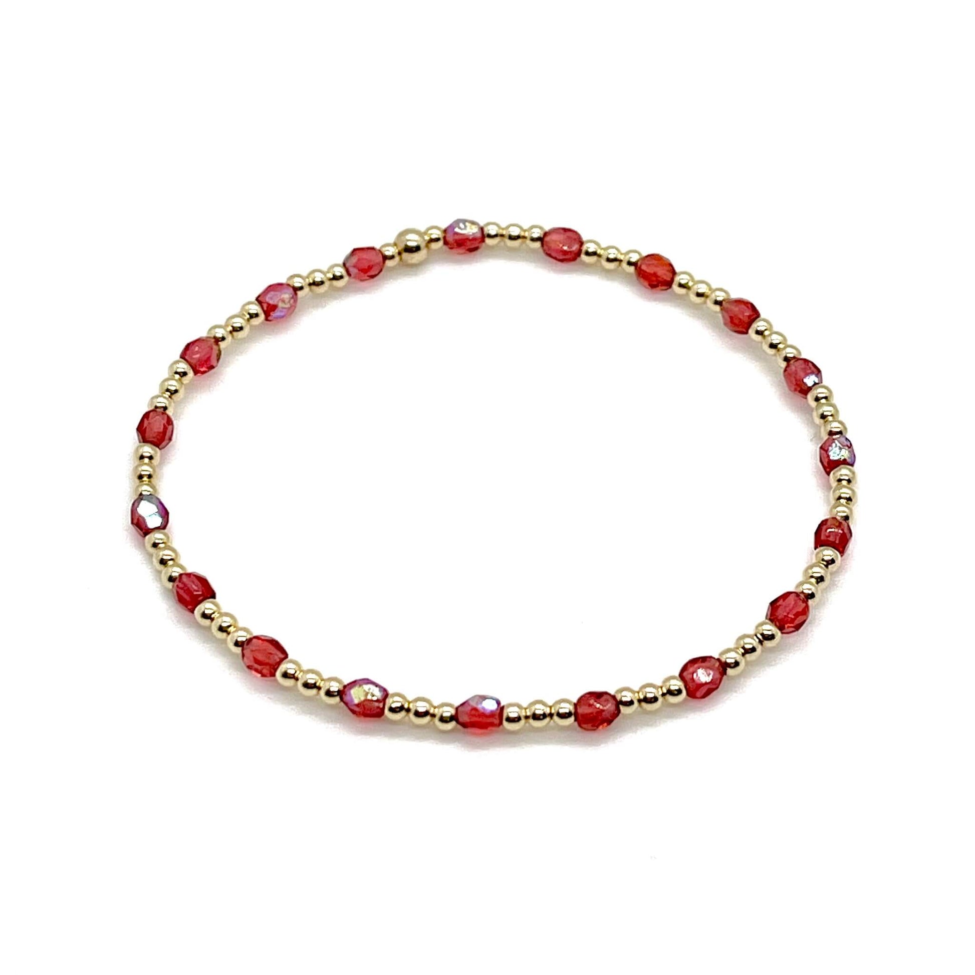 Coral-red crystal bracelet with 14K gold filled beads. Women's beaded stretch bracelet.