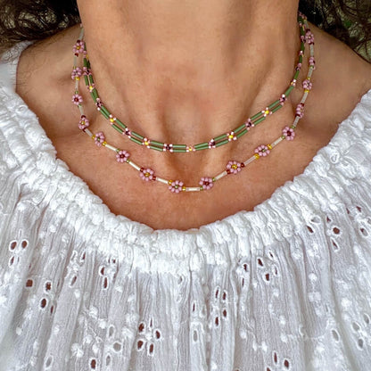 Dainty bead necklaces with green, lilac, and white seed and bugle beads. Woven and daisy chain necklaces handmade in NYC.