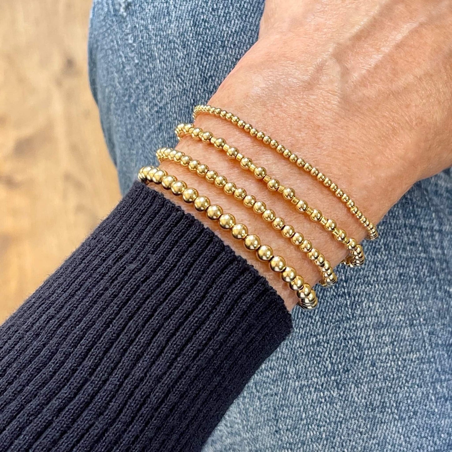 Gold ball bracelets. Gold stretch bracelets for stacking in 2mm, 3mm, & 4mm waterproof, tarnish-resistant beads.