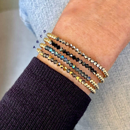 Gold dainty crystal stretch bracelets with tiny multi-color faceted glass crystal beads.