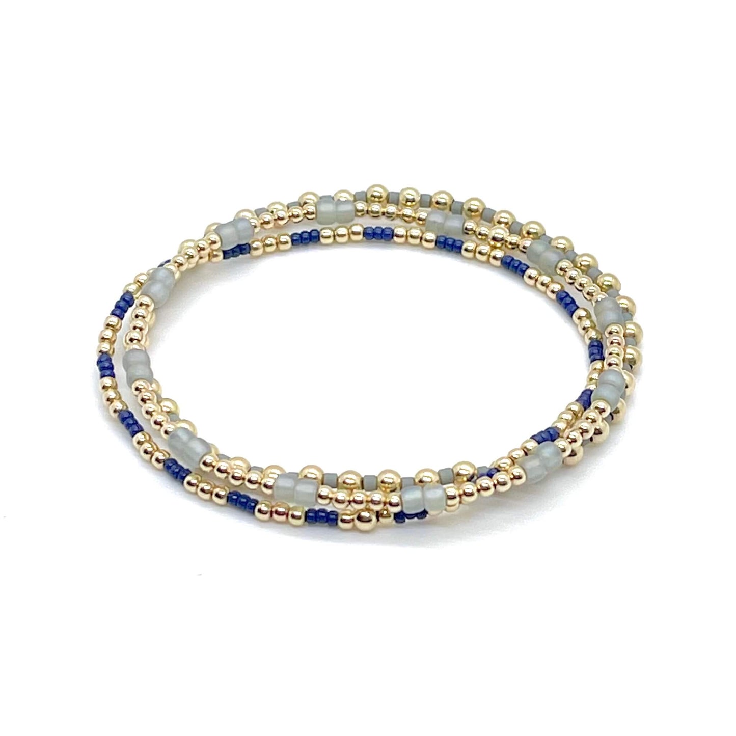 Handmade delicate gold beaded stretch bracelets with gray and navy blue tiny seed beads | Stack of 3.