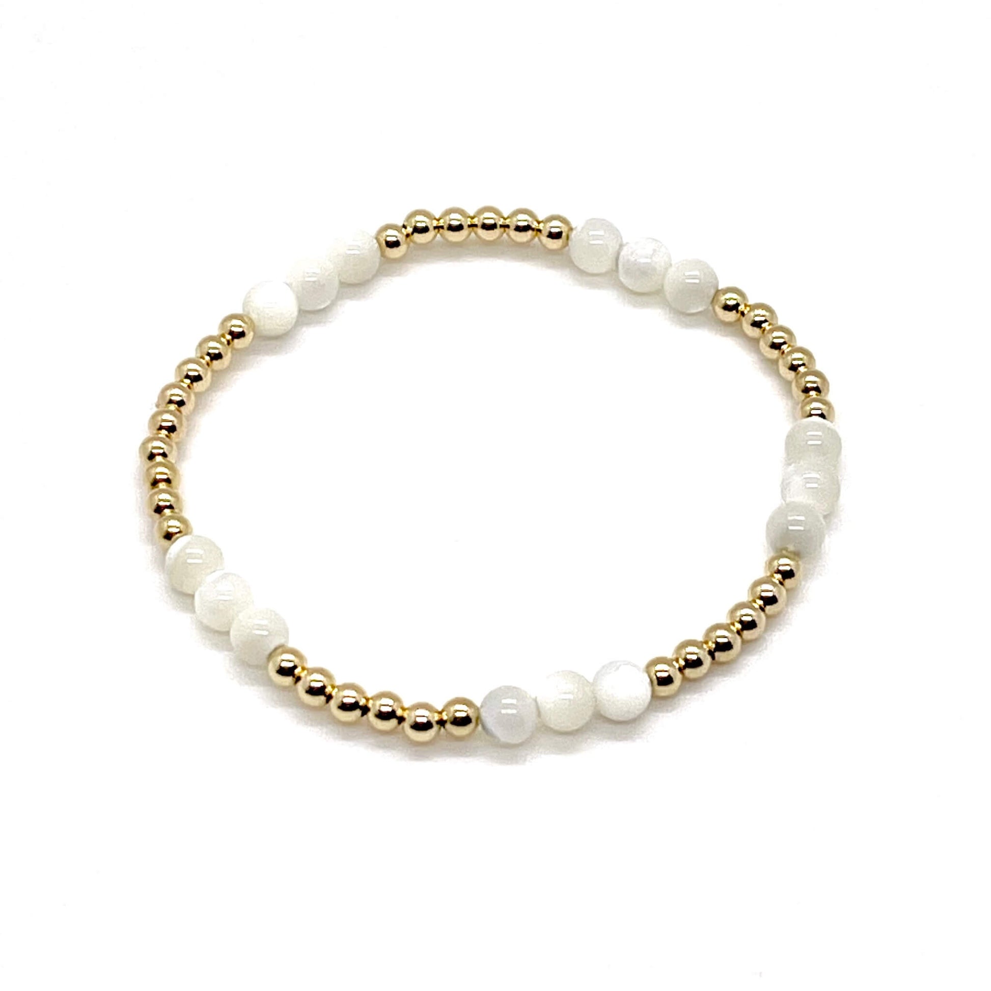 Gold mother-of-pearl bracelet with 14K gold-filled 3mm beads and 4mm mother-of-pearl beads.