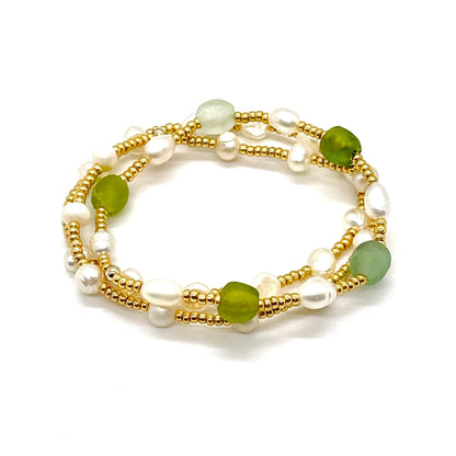 Green and pearl bracelets with sea glass, freshwater pearls, and gold tone seed beads.