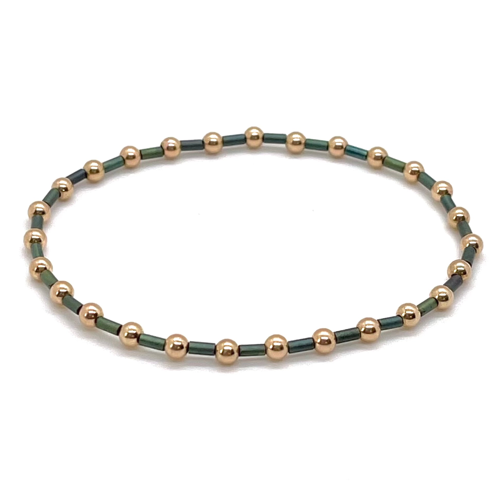 Green bugle bead dainty stretch bracelet with 3mm 14K rose gold filled beads. Waterproof and tarnish resistant.