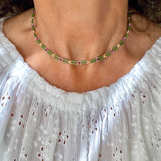 Green beaded necklace with 2 rows of bugle beads and pink floral beaded accents. Handmade in NYC