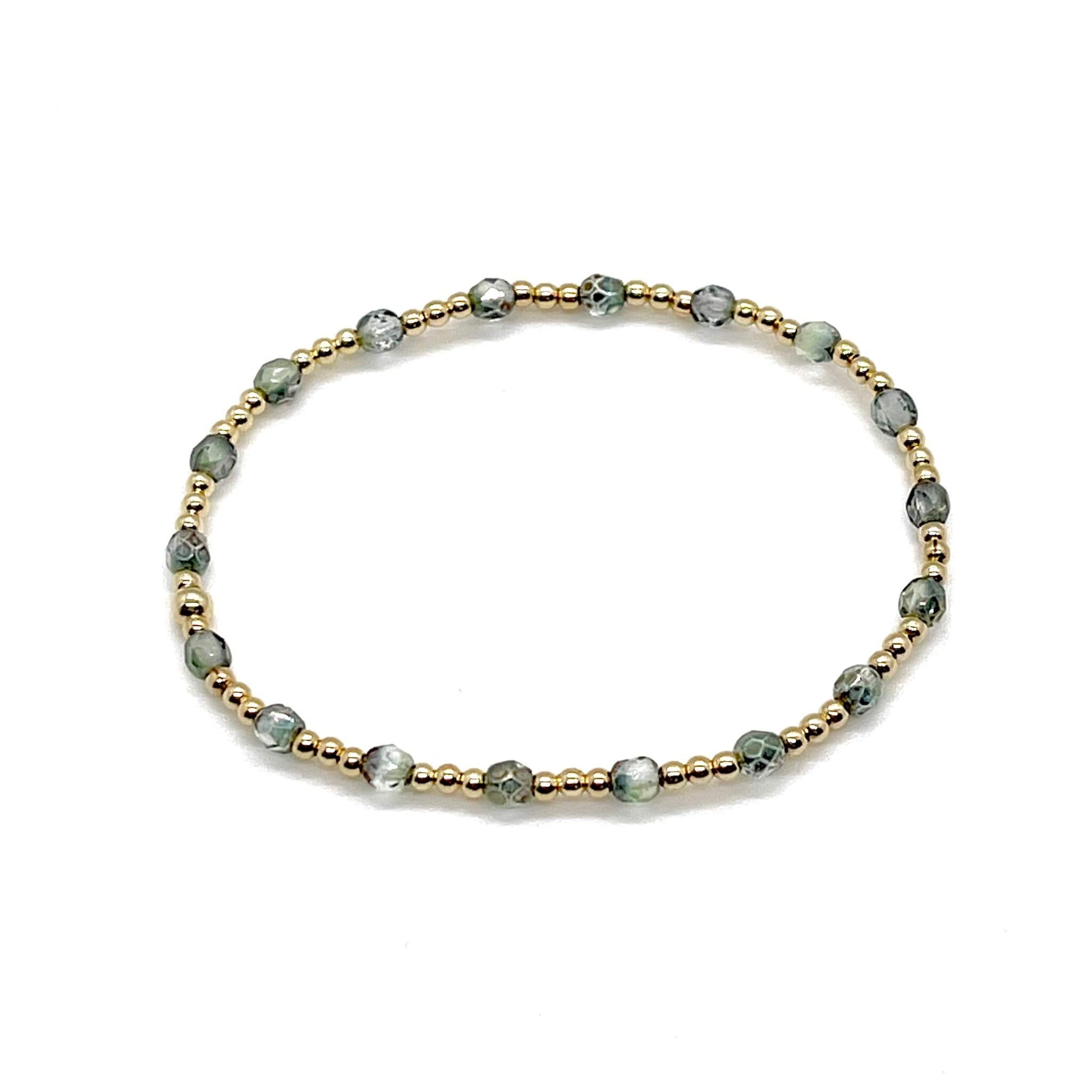 Green-grey crystal bracelet with waterproof, tarnish-resistant gold filled beads. Dainty handmade womens stretch bracelet.