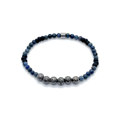 Men’s handmade beaded elastic bracelet with gunmetal coated lava beads, blue dumortierite beads, & matte black seed beads.