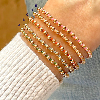 Handmade beaded bracelets with rose gold and glass seed beads in assorted colors. Stretch bracelets.