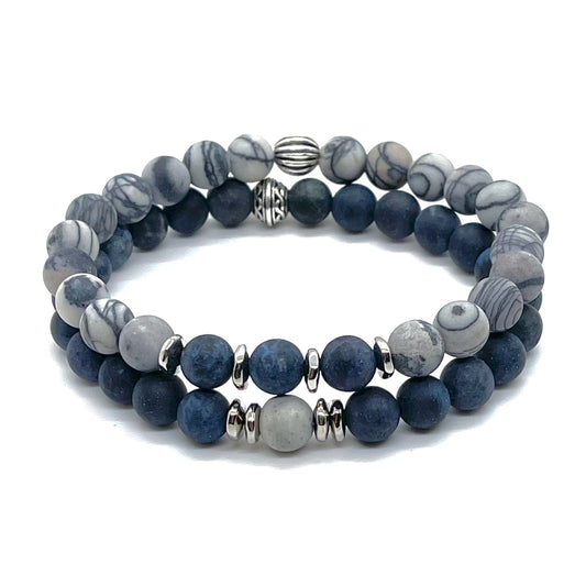 Mens beaded bracelets with matte blue dumorierite and black sillk gemstones and silver beads on stretch cord.