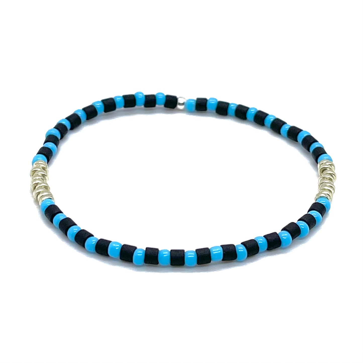 Mens black and light blue bracelet with tube and round shaped glass seed beads and silver-tone accent disks on elastic stretch cord.