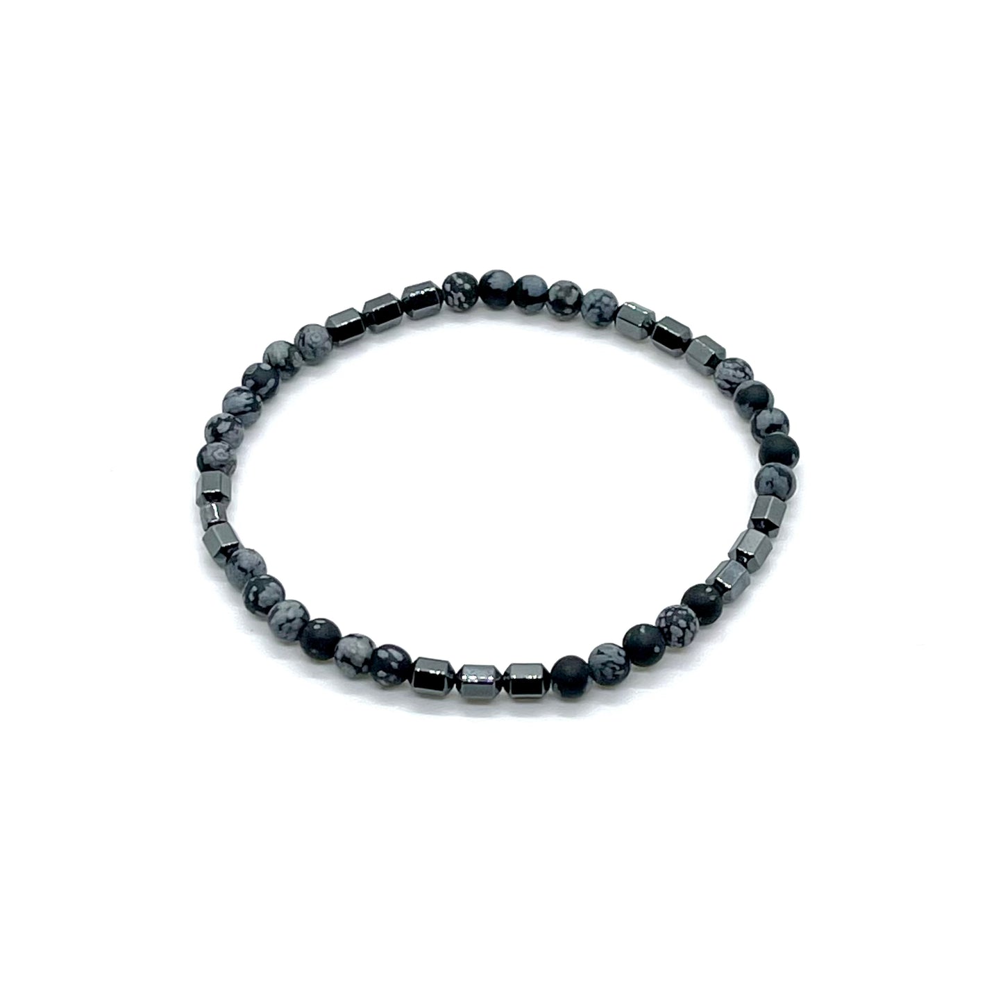 Men's obsidian bracelet with black and gray speckled beads and gunmetal hematite beads on elastic stretch cord.