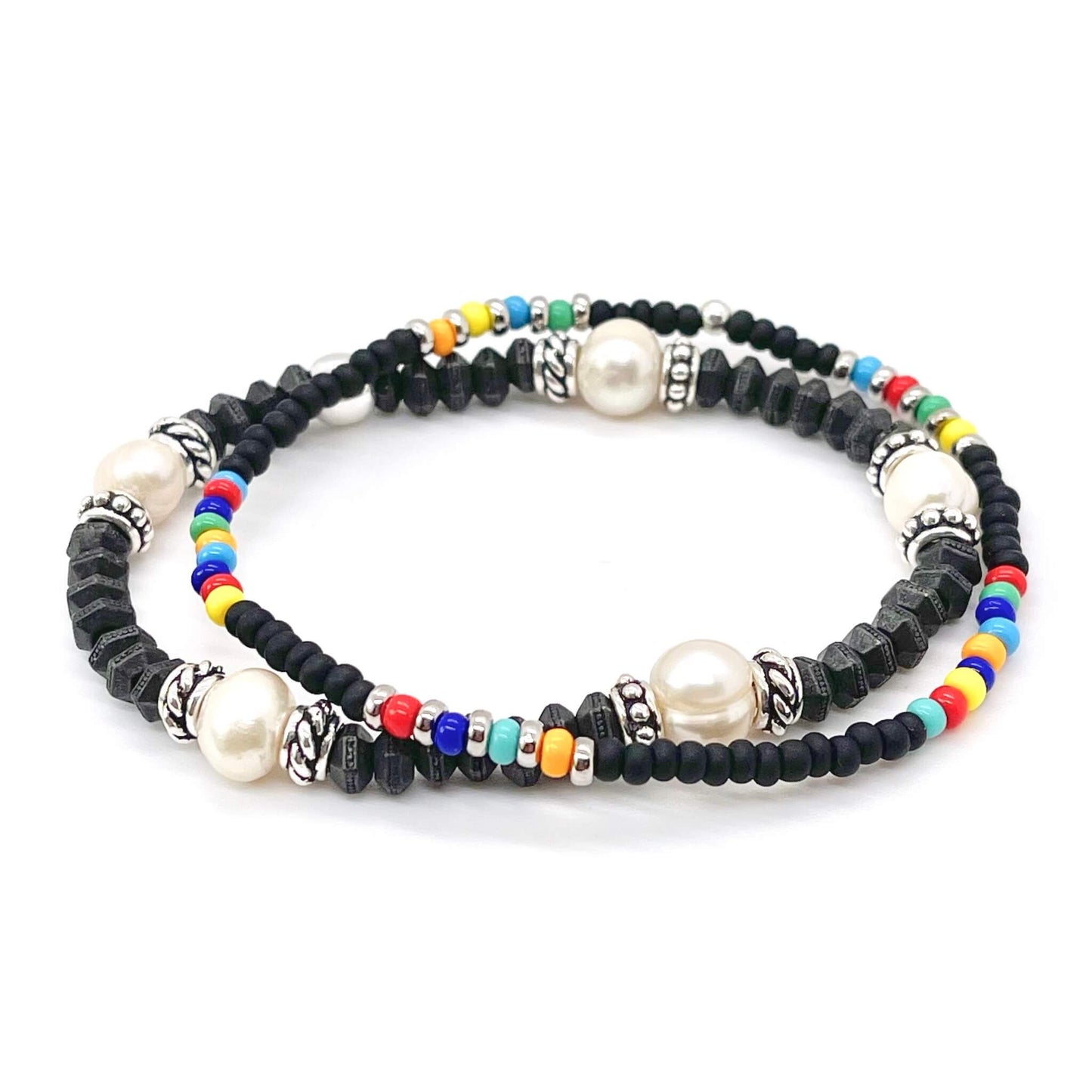 Pearls for men. Trendy pearls. Modern, edgy black and pearl bracelets for men.