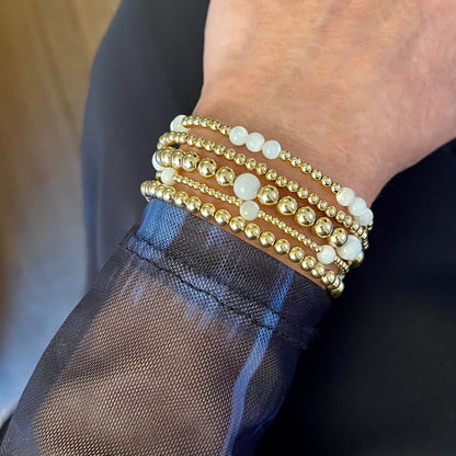 Mother-of-pearl gold bracelet stack of 5.