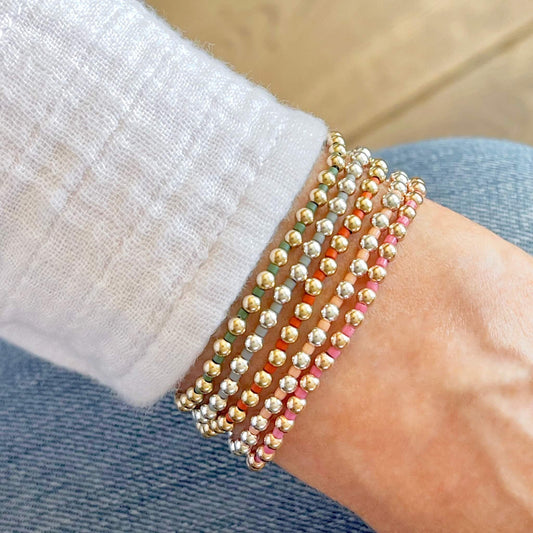 Popular stackable bracelets. Gold fill stretch bracelets, silver stretch bracelets, handmade seed bead bracelets.