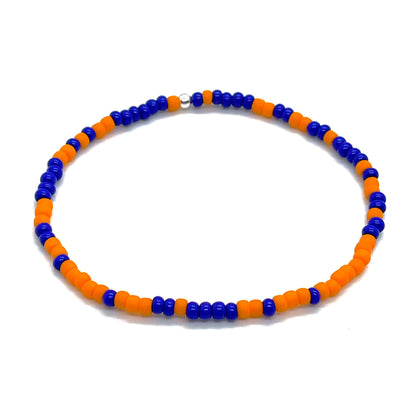 Orange and blue colorblock thin seed bead stretch bracelet for men.