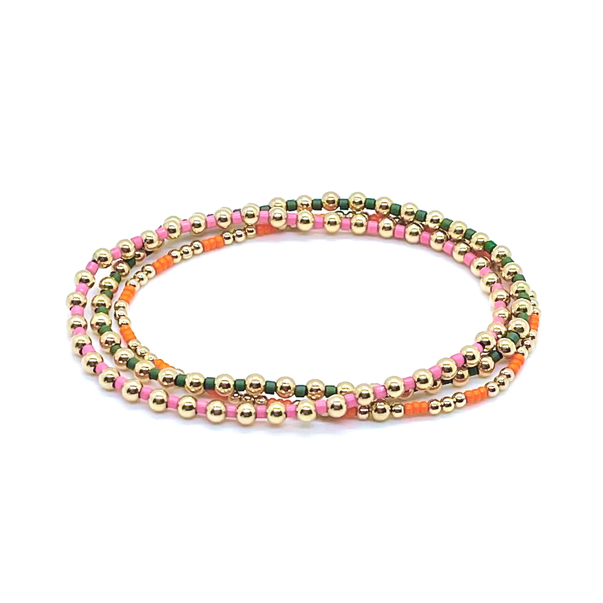 Orange, pink, and green gold ball stretch bracelet set of 3 for women. 14K gold-filled balls and glass seed beads.