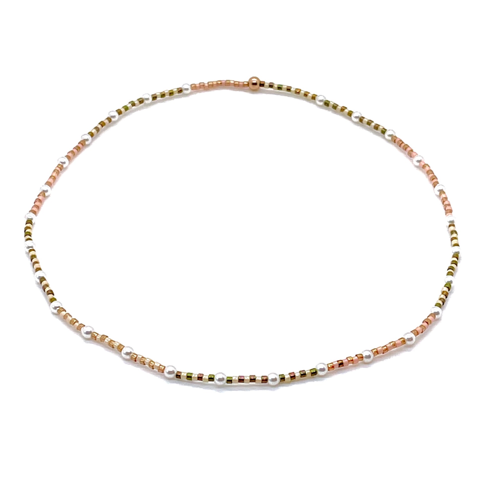 Pearl choker with pale peach and green seed beads on stretch cord. Dainty and soft pastel hues.