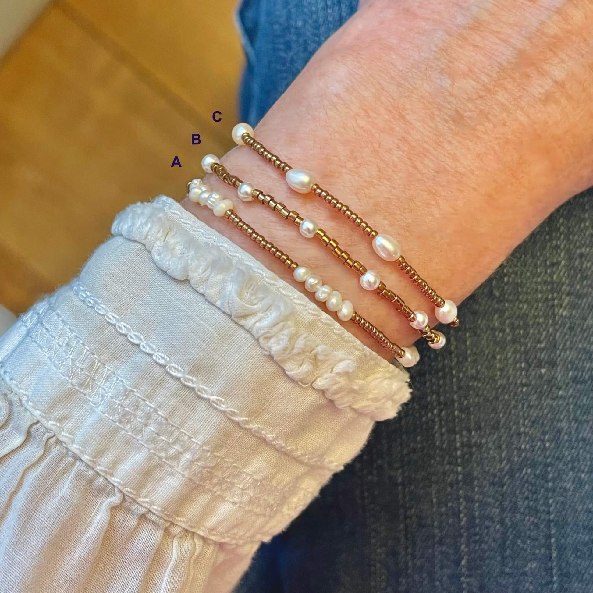 Pearl and rose gold beaded stretch bracelets with tiny glass seed beads, and freshwater and crystal pearl beads.