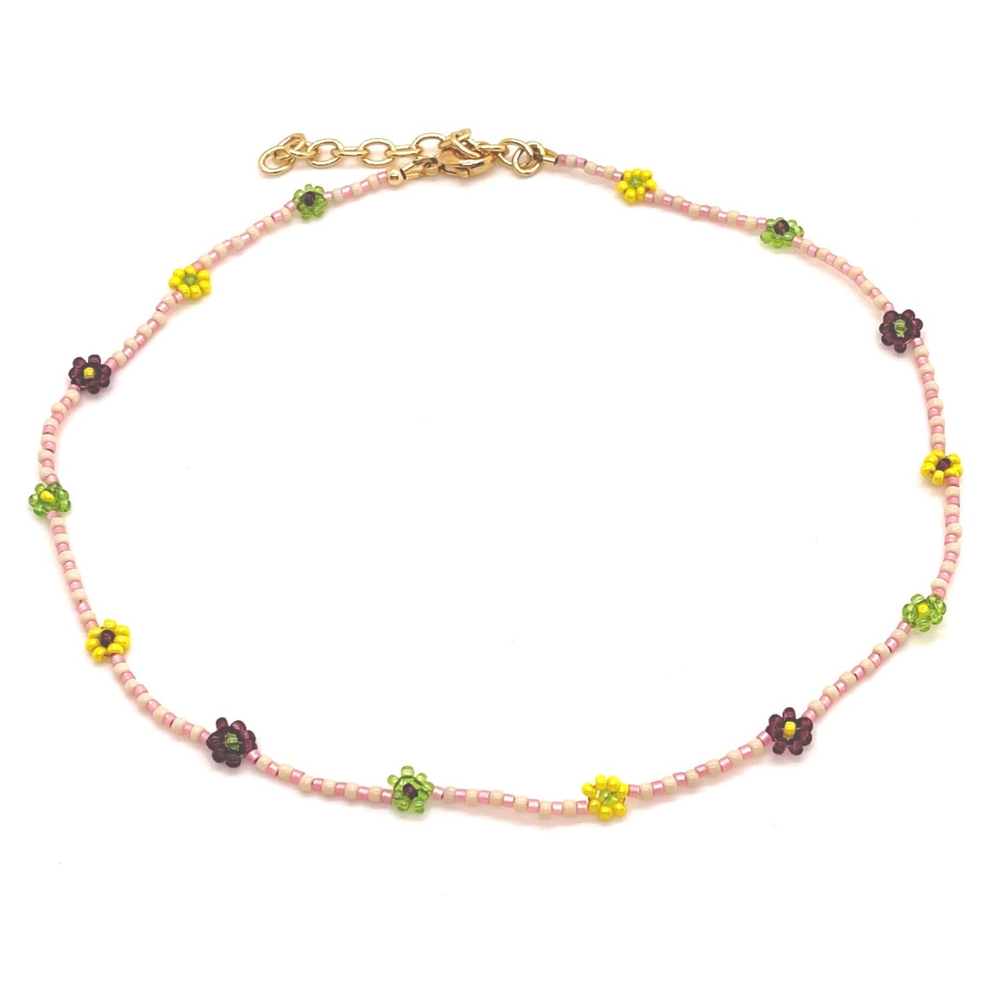 Pink beaded necklace with daisy chain flowers. Dainty pink and cream necklace with tiny plum, yellow, and green seed bead flowers.