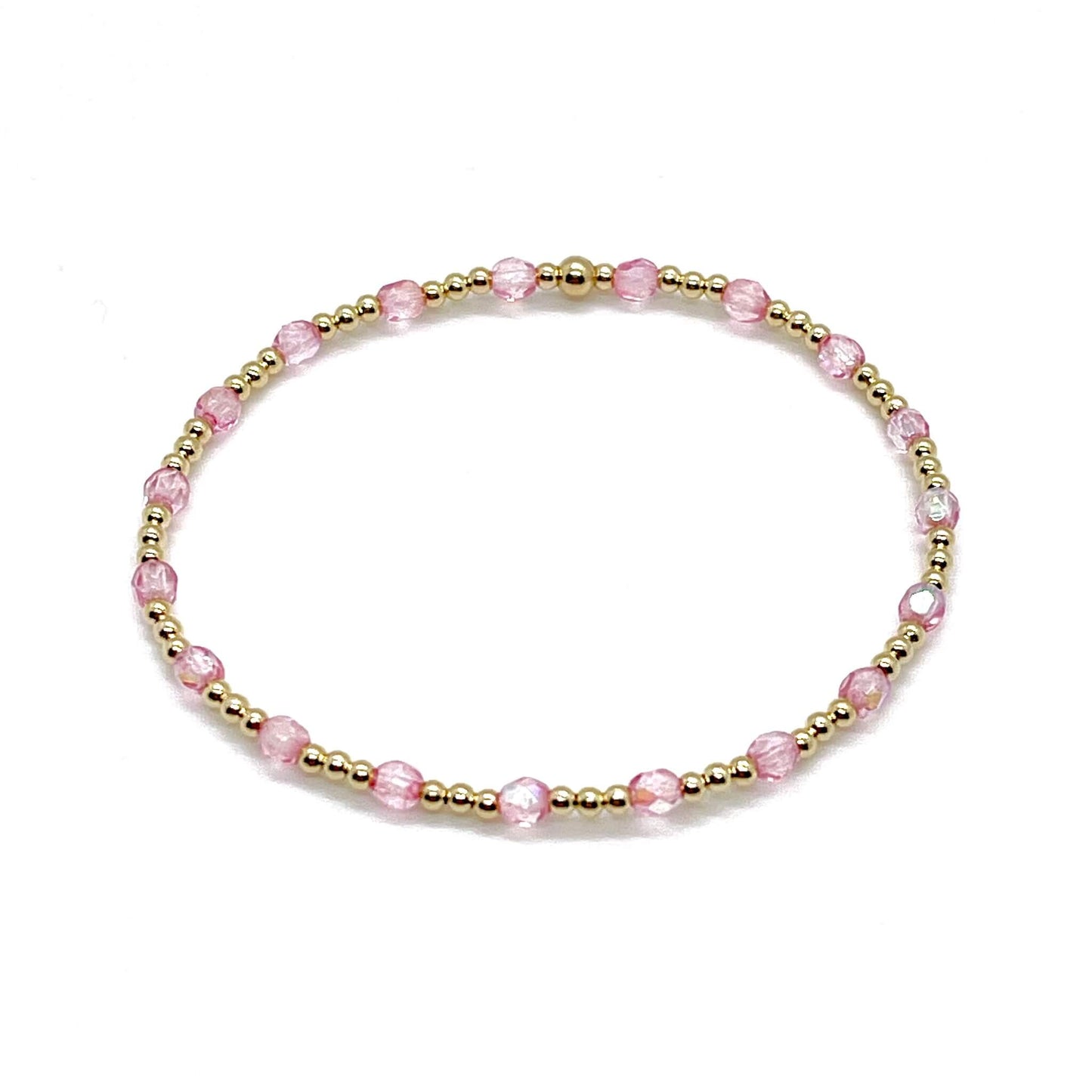 Pink crystal bracelet wtih gold beads. Delicate, handmade womens stretch bracelet.