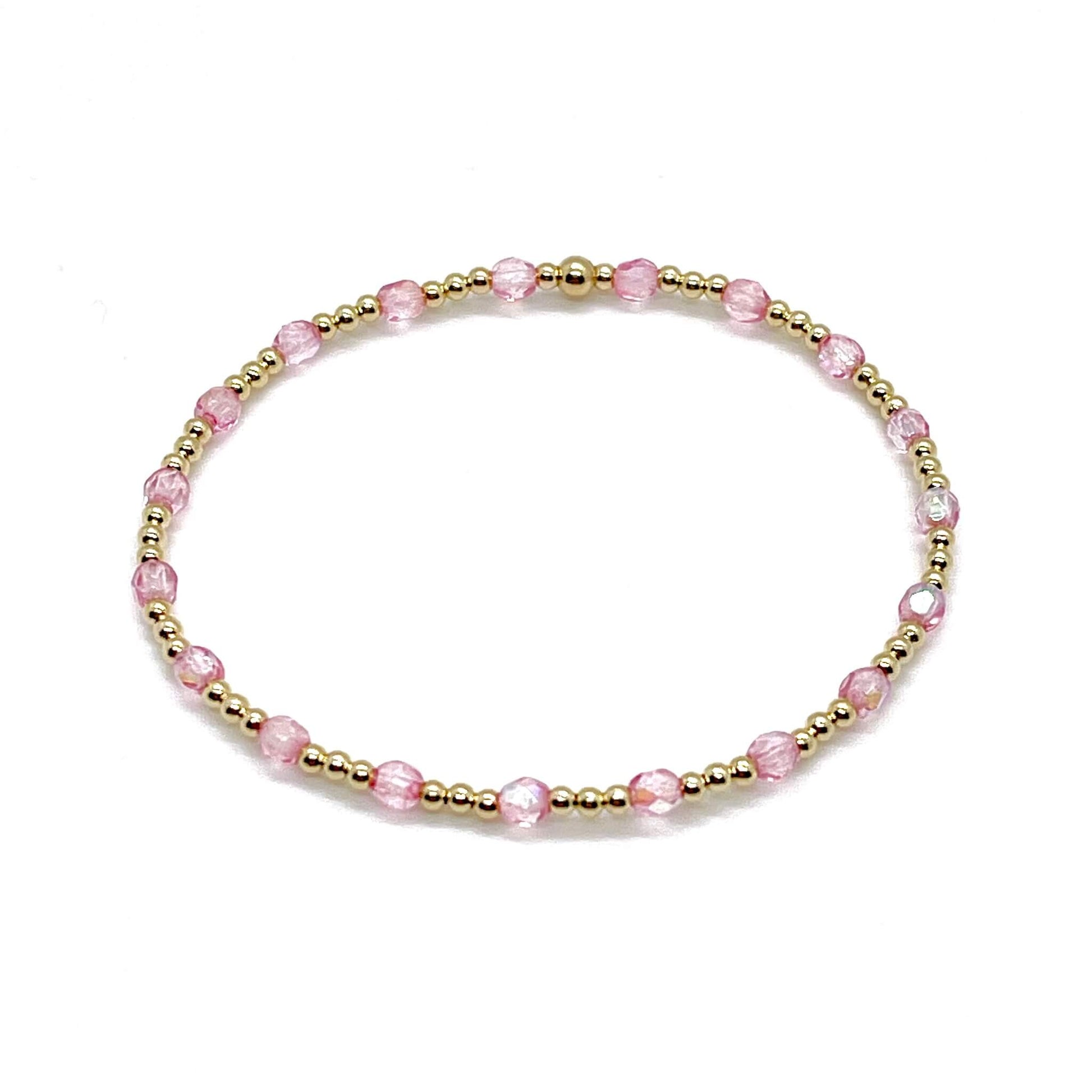 Pink crystal bracelet wtih gold beads. Delicate, handmade womens stretch bracelet.