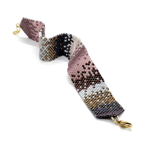 Purple, pink, bronze ombre beaded bracelet cuff handmade in NYC with tiny glass seed beads and peyote stitch.