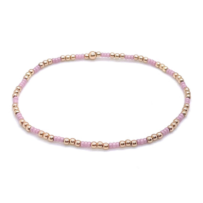 Purple bead bracelet with dainty seed beads and tiny 2mm 14K rose gold filled balls.