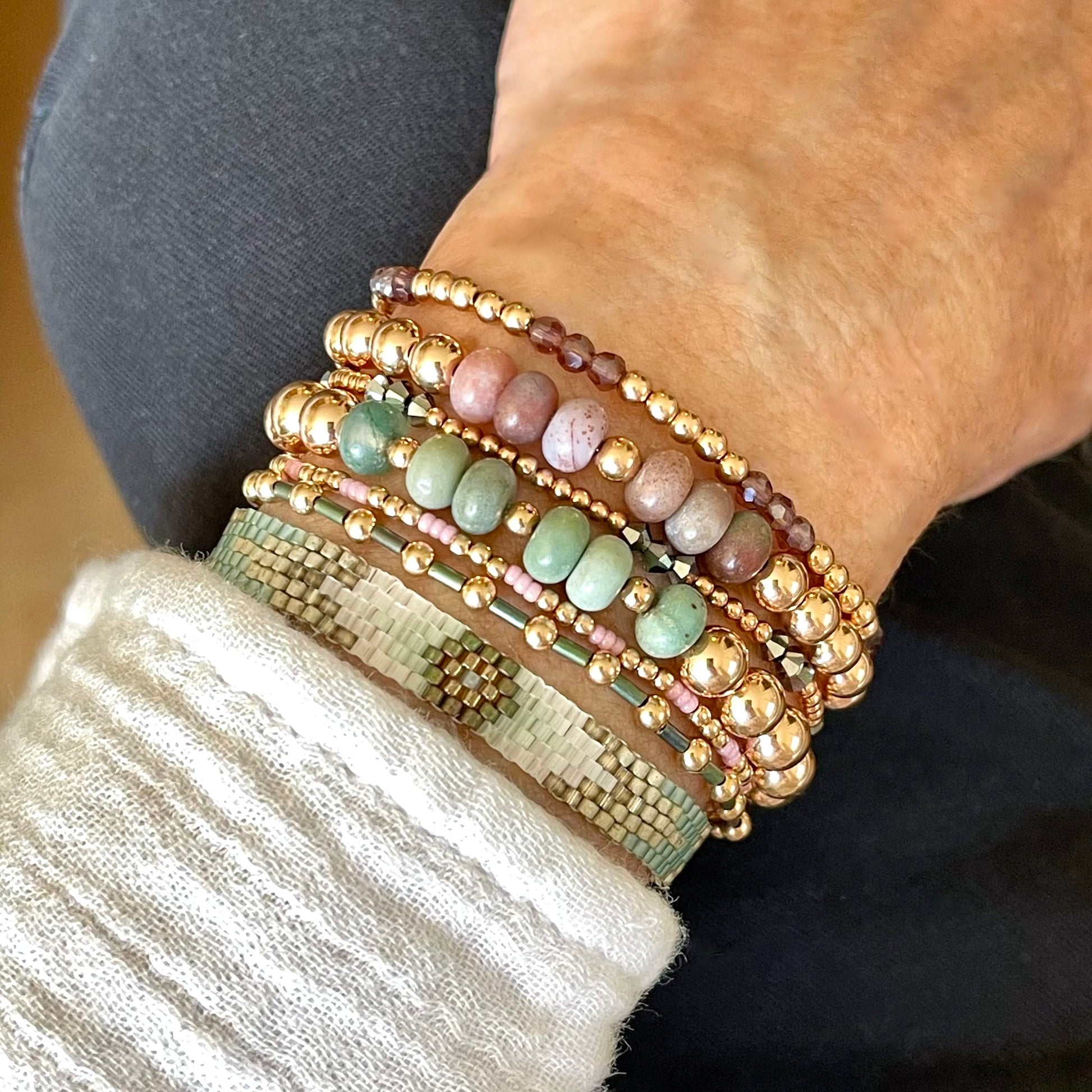 Purple and green jasper with rose gold beads stack of 7 stretch and woven beaded bracelets.