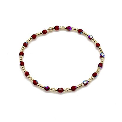 Red crystal bracelet with gold beads. Elegant, delicate womens stretch bracelet handmade in NYC.