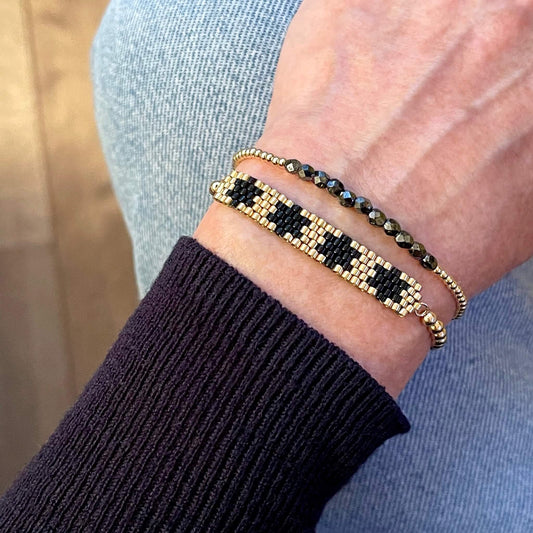 Star bracelet set | Stretch bracelets with 14K gold filled balls, black crystals, and black and gold-tone seed beads.