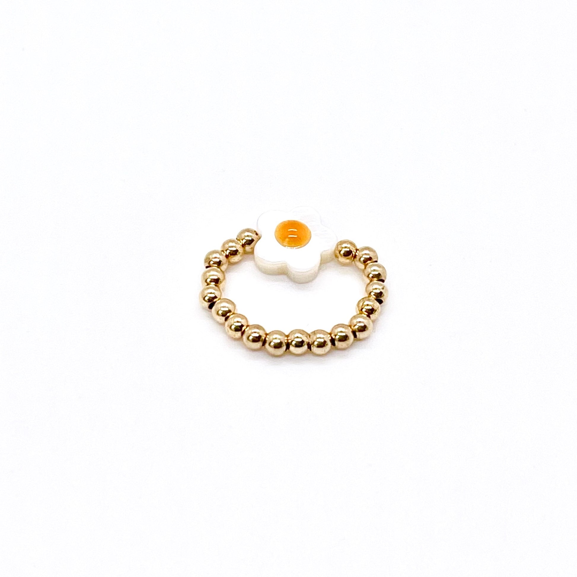 Beaded flower ring with 3mm 14K gold filled beads on stretch cord.