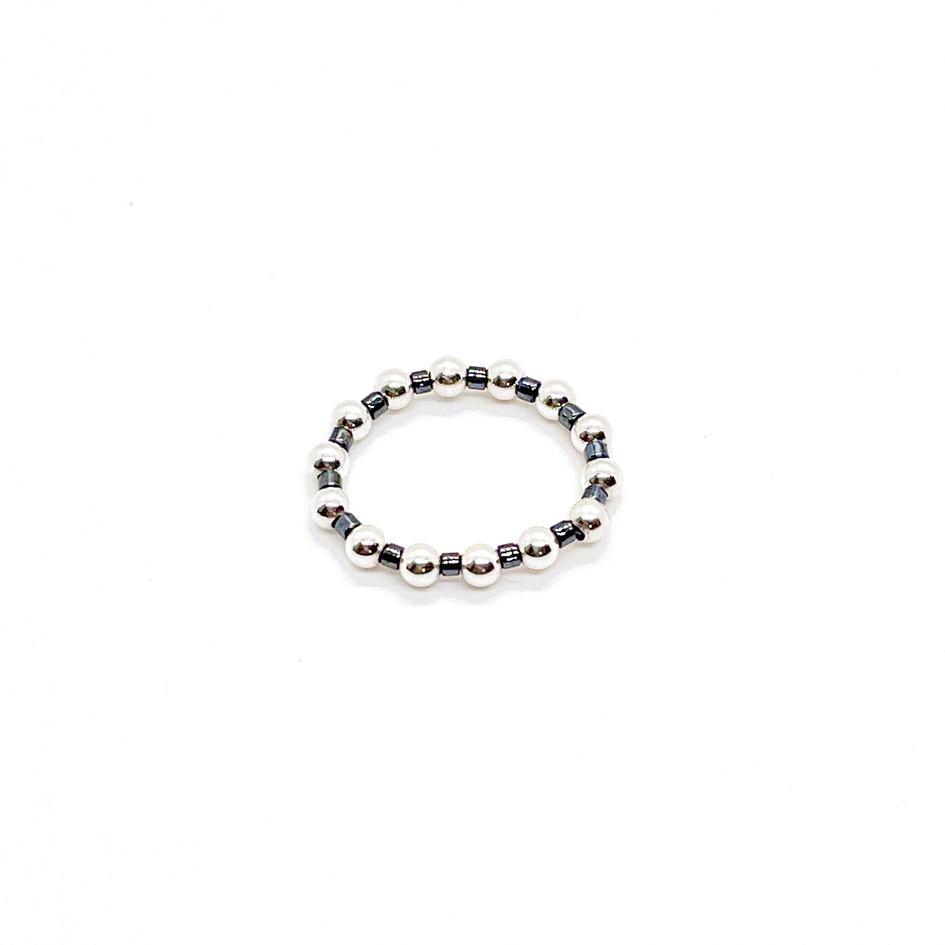 Beaded ring | 3mm sterling silver ball ring with black seed beads on stretch cord.