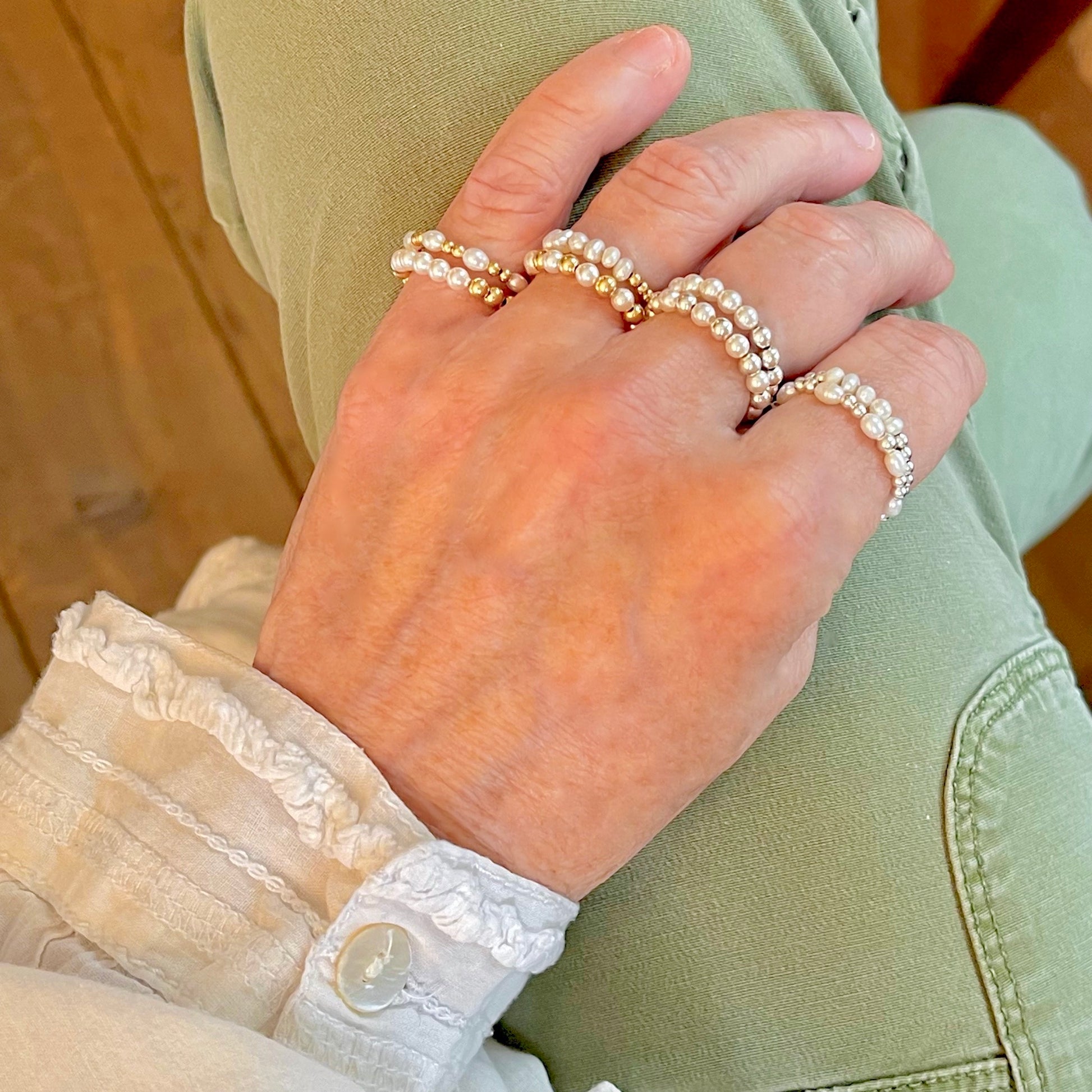 Dainty pearl rings with gold and silver ball beads and freshwater and crystal pearls on stretch cord.