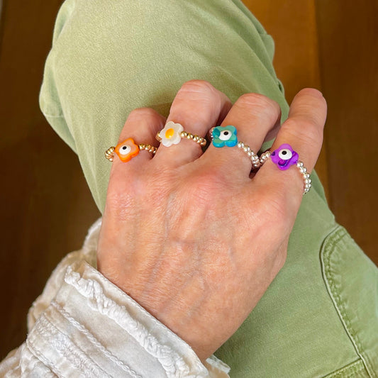 Evil eye gold and silver rings | Beaded stretch ball rings with colorful evil eye and flower shell beads.